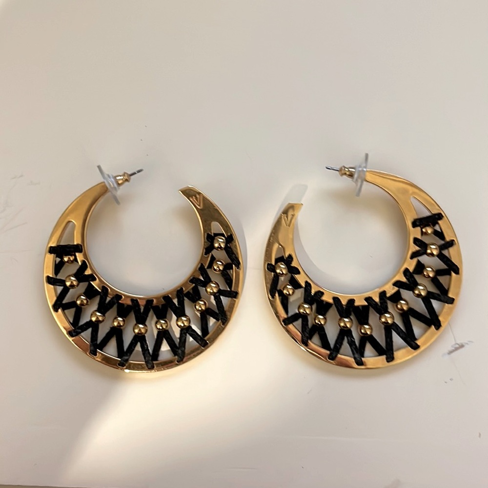 Gold plated hoops with threaded leather